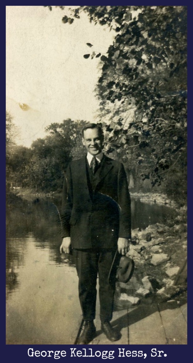 George Kellogg Hess, Sr. holding hat by water's edge